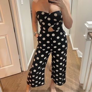 Polka dot jumpsuit with pockets and cut out